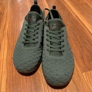 Green APL gym shoes.